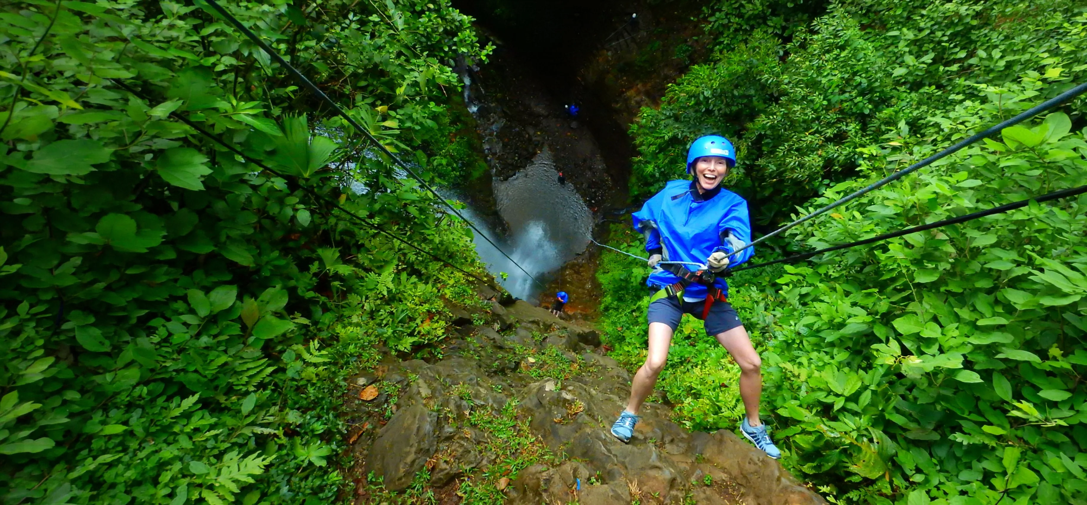 Woman rappelling in Costa Rica